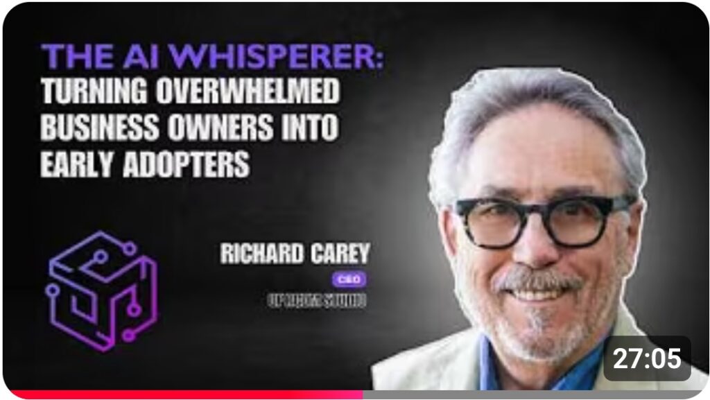 Promo thumbnail for a video titled 'The AI Whisperer: Turning Overwhelmed Business Owners into Early Adopters' with a smiling man in glasses on a dark background and a purple cube logo on the left (Richard Carey). Use for a podcast/video featuring AI adoption.